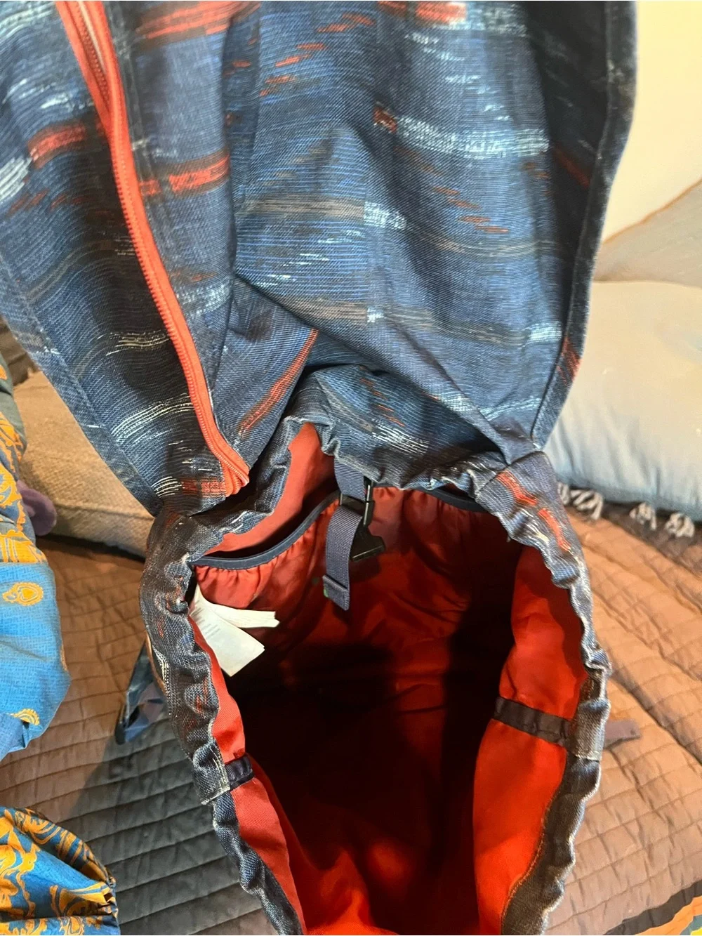 Patagonia Navy Blue Patterned Daypack with Rust Accents.  25L